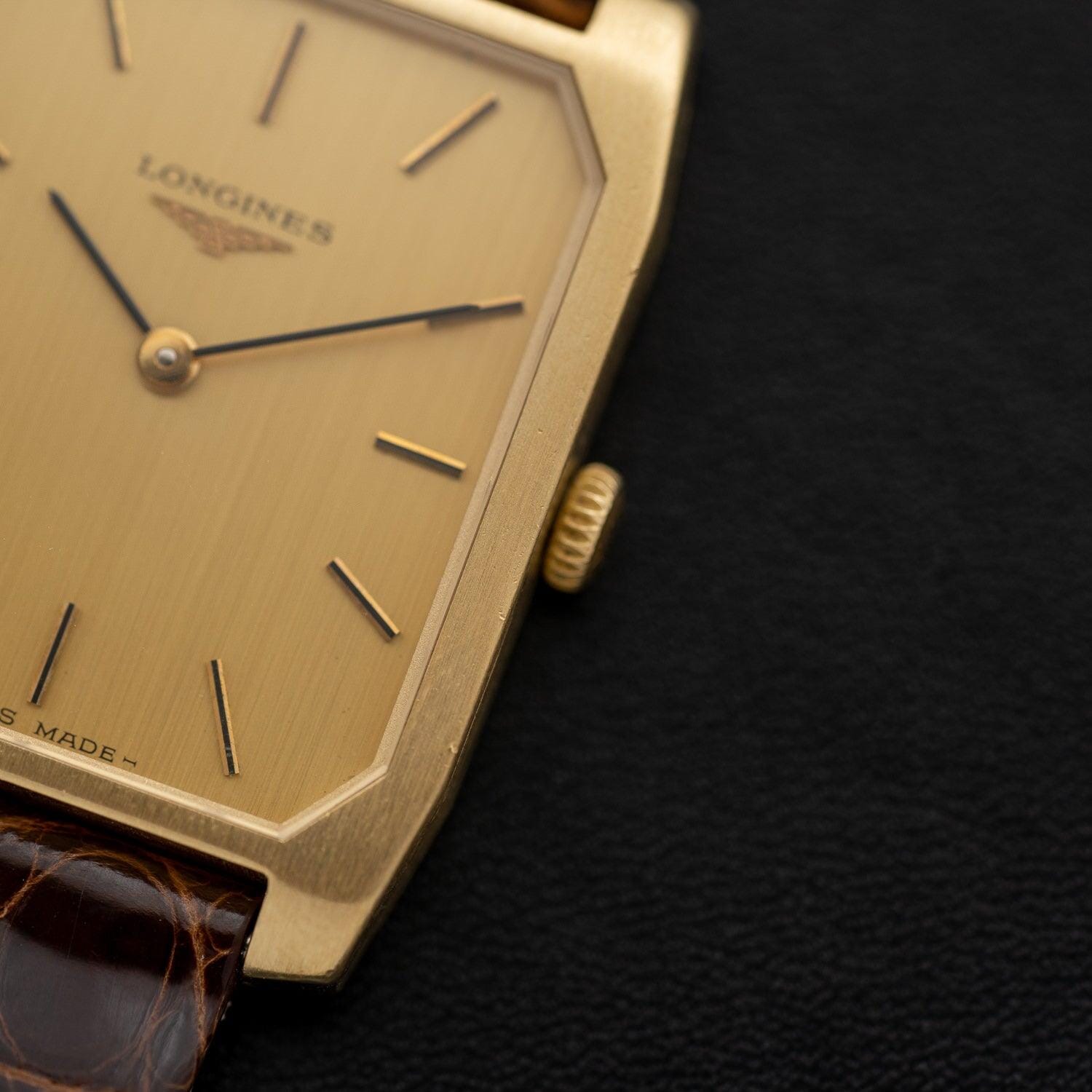 Longines Rectangle 4051 18K YG manual winding with archive extract